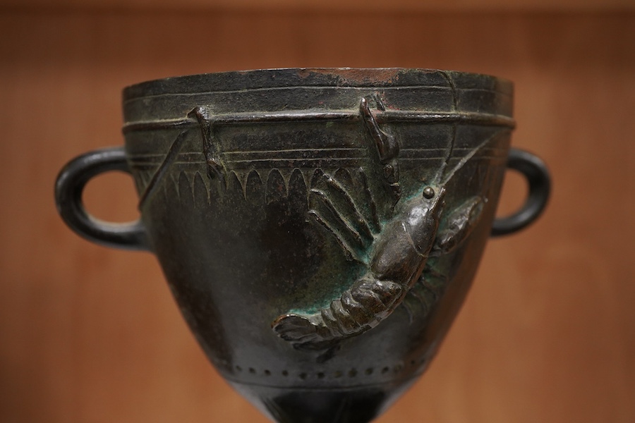 A 19th century French bronze twin handled vase signed Augur, cast with crayfish on black slate plinth, 22cm